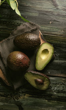Overhead View Of Avocados On Cutting Board