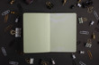 © Anton - Layout with green notebook for lettering or design, with .business, work.black style. mockup