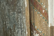 The texture of an old concrete wall with drawings and patterns.