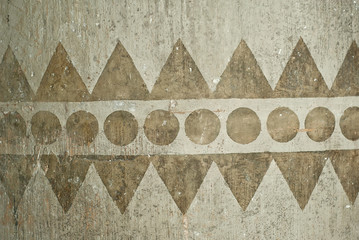 Wall Mural - The texture of an old concrete wall with drawings and patterns.