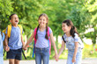 © Pixel-Shot - Group of cute little pupils outdoors