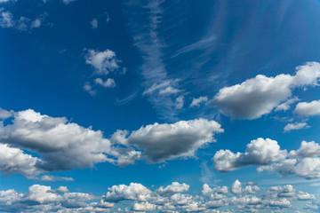 Beautiful blue sky with white clouds as a natural background.