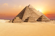 The famous Giza Pyramids in the desert at sunset, Egypt