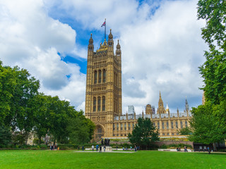 Palace of Westminster (Houses of Parliament) with Victoria Tower viewed from Victoria tower gardens, London, England, UK.