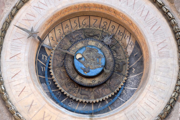 Wall Mural - Clock tower of Palace of Reason (Palazzo della Ragione with the Torre dell'Orologio) in Mantua, Italy 