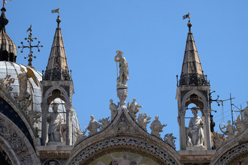 Wall Mural - Statue of Saint, detail of the facade of the Saint Mark's Basilica, St. Mark's Square, Venice, Italy