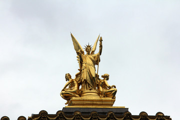 Wall Mural - Golden statue of Angel on the top of the Garnier Opera in Paris, France (The Poetry by Charles Gumery)