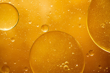 Wall Mural - golden yellow bubble oil, abstract background