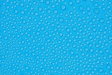  closeup drops water on blue background