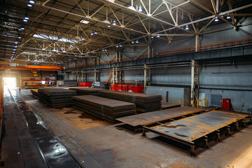 Wall Mural - Stack of steel sheets in warehouse