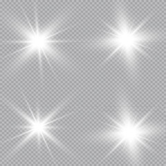 Set of Vector glowing light effect stars bursts with sparkles on transparent background. Transparent stars.