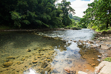 Ton Kloi Waterfall ,in the forest at Ban Siam,Ranong,Thailand. Used in editing.Create a graphic,Creative travel business