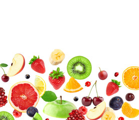 Wall Mural - Mixed fruits on white. Falling fruits.