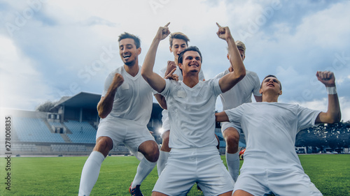 Captain of the Soccer Team Stands on His Knees Celebrates Awesome Victory,  Makes YES Gesture Champion Team Joins Him. Successful Happy Football  Players Celebrate Victory. - Buy this stock photo and explore