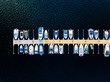 Aerial view of boats, yachts, water bike and wooden sauna in a marina in Finland