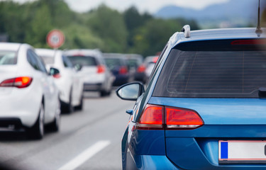 Cars in row on highway in traffic jam 