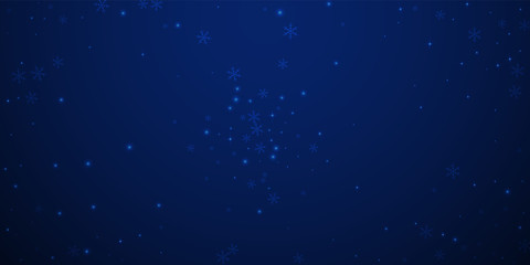 Sparse glowing snow Christmas background. Subtle f