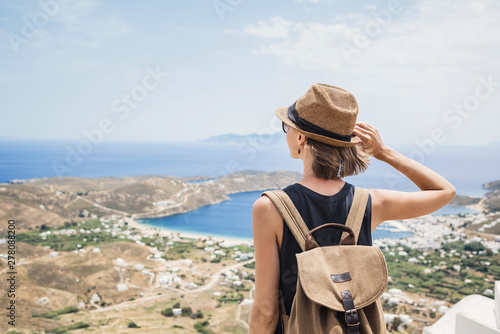 Cuadros en Lienzo Young woman traveler looking at the sea in Greece