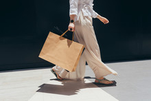Unrecognisable Stylish Woman Walking With Shopping Bags.