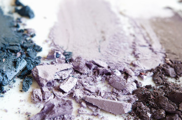 Wall Mural - Eyeshadow cosmetic powder scattered. The concept of fashion and beauty industry. Close-up. - Image