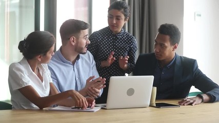 Wall Mural - Diverse indian and caucasian mentors teach team discuss online project