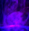 © pomah - Abstract swirling purple smoke for background.