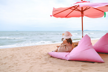 Wall Mural - Woman on beach in summer