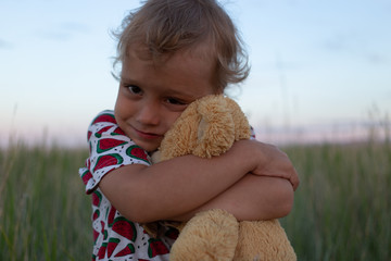 Wall Mural - little boy with teddy bear