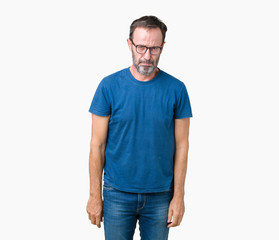 Poster - Handsome middle age hoary senior man wearin glasses over isolated background depressed and worry for distress, crying angry and afraid. Sad expression.