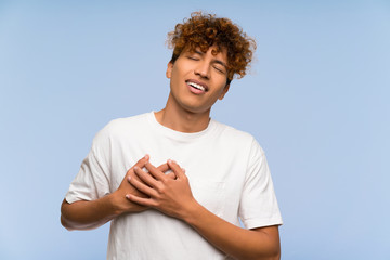 Wall Mural - Young african american man with white shirt in love