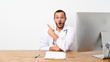 © luismolinero - Doctor Colombian man surprised and pointing side