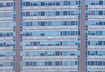 Background of the windows and balconies of the multi-storey building.