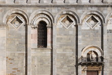 Romanesque Marble Facade Detail At Pisa Cathedral In Italy