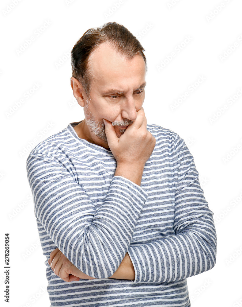 Portrait of thoughtful mature man on white background