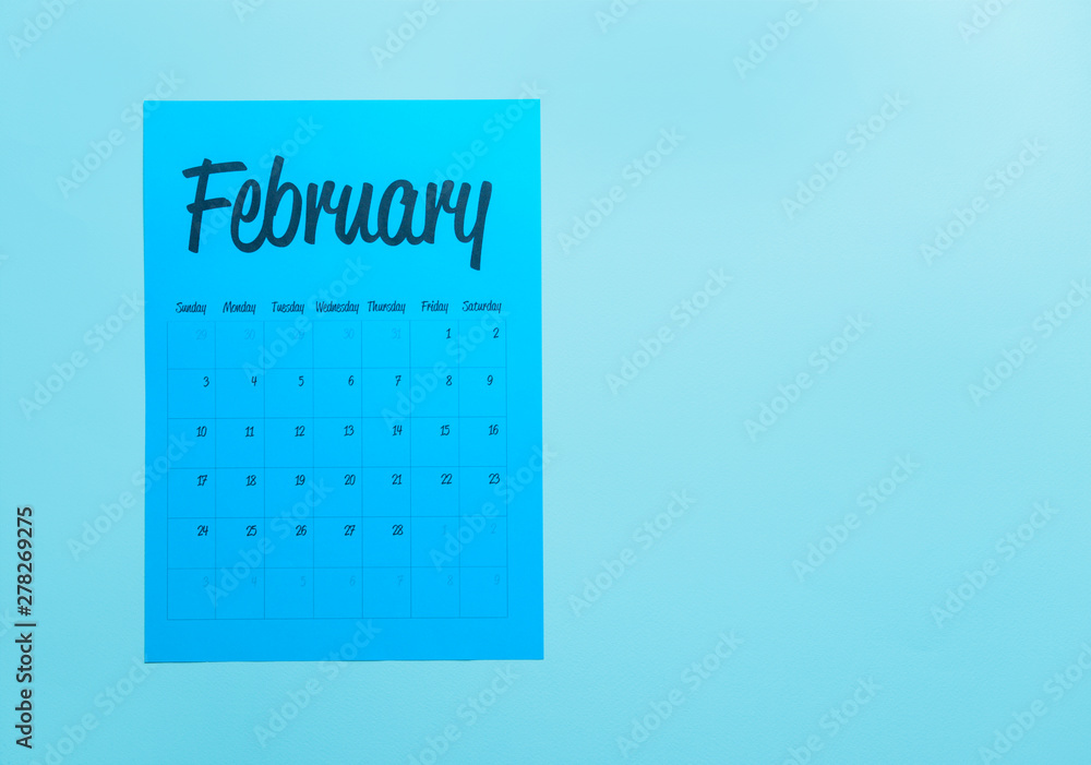 Sheet of paper calendar on color background