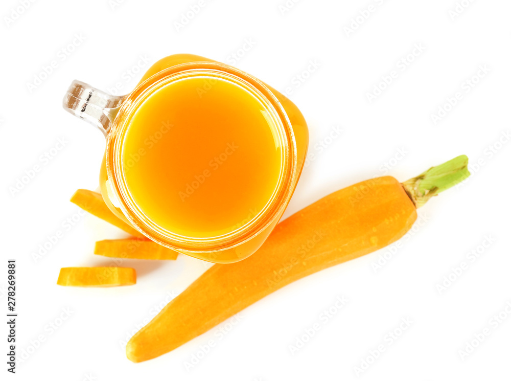 Mason jar of fresh carrot juice on white background