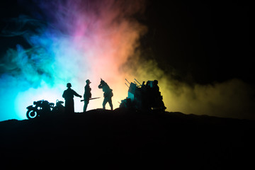 War Concept. Military silhouettes fighting scene on war fog sky background,