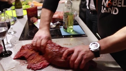 Wall Mural - Chef cook cooking meat with spices. Fillet raw meat, food master class, editorial video