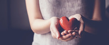 Asian Woman Holding Red Heart, Health Insurance, Organ Donor Day, Charity Concept, World Health Day, World Mental Health Day, World Heart Day,gratitude, All Lives Matter Concept