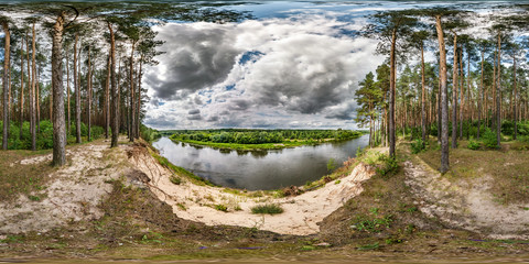 Wall Mural - full seamless spherical hdri panorama 360 degrees angle view on high bank of wide river neman near pinery forest in windy day with beautiful clouds in equirectangular projection, ready VR AR content
