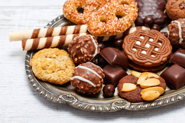 Sticker - Mix of sweets: cookies, chocolates and pralines.