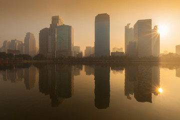 Morning at the business district from Benjakiti Park Bangkok , Thailand