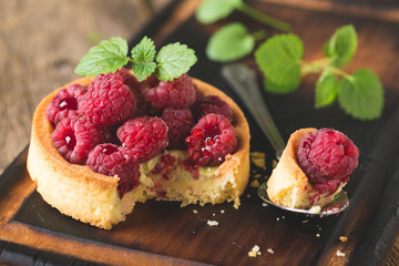 Cake with fresh raspberries and mint