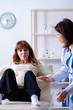 © Elnur - Young pregnant woman visiting experienced doctor gynecologist