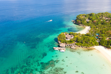 Wall Mural - Beautiful Punta Bunga Beach on Boracay island, Philippines. White sandy beach and beautiful lagoon with coral reefs. The coast of the island of Boracay for tourists.