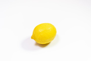 a lemon with a white background