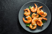 Grilled Shrimps On Plate On Dark Background