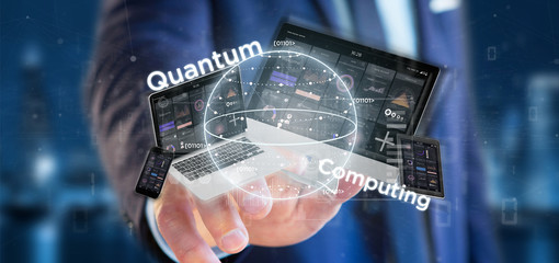 Wall Mural - businessman holding quantum computing concept with qubit and devices 3d rendering
