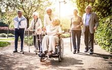 Group Of Old People Walking Outdoor