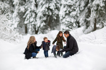  Family playing in the snow